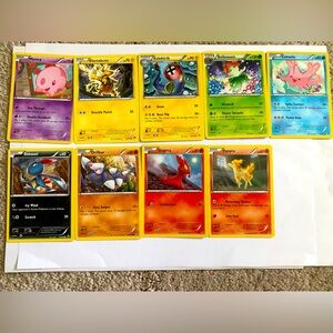 9 preowned Minted pokemon cards